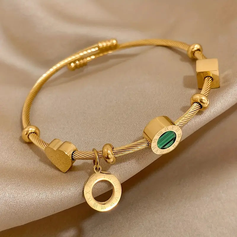 Rhian – Goldene Armband von der Marke