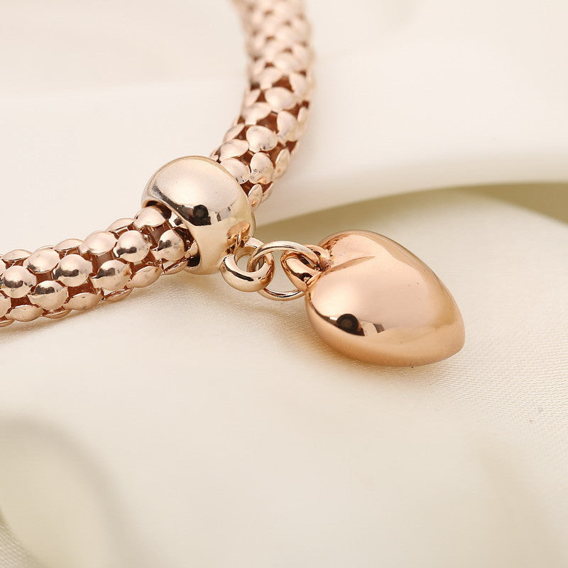 Aria – Metallarmband mit soliden Herzen