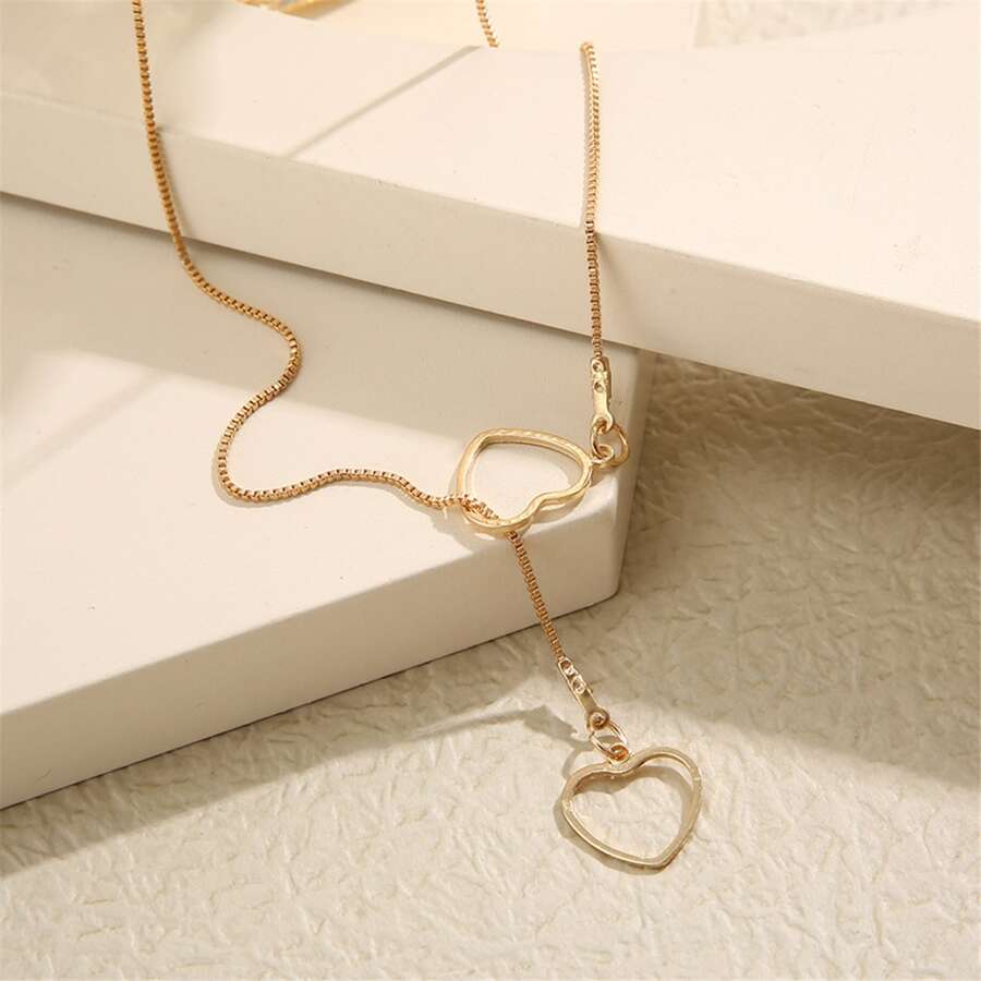 Halskette mit Herztröpfchen - Halskette mit goldenen Tropfen und 2 Herzen
