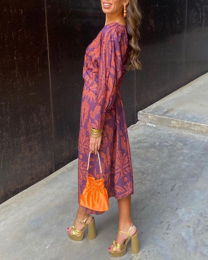 Grace – Chic Midi-Kleid mit Blumendesign und Schleife