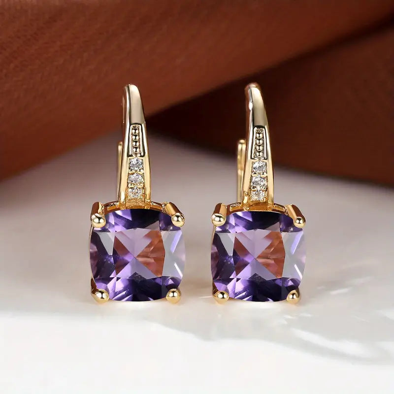 Claudine – Ohrringe aus Gold mit mystischem Saphir