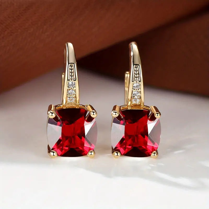 Claudine – Ohrringe aus Gold mit mystischem Saphir