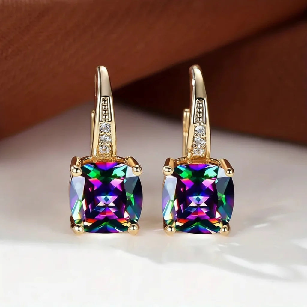 Claudine – Ohrringe aus Gold mit mystischem Saphir