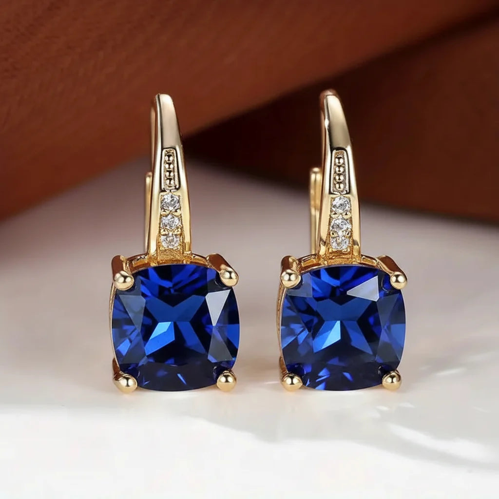 Claudine – Ohrringe aus Gold mit mystischem Saphir