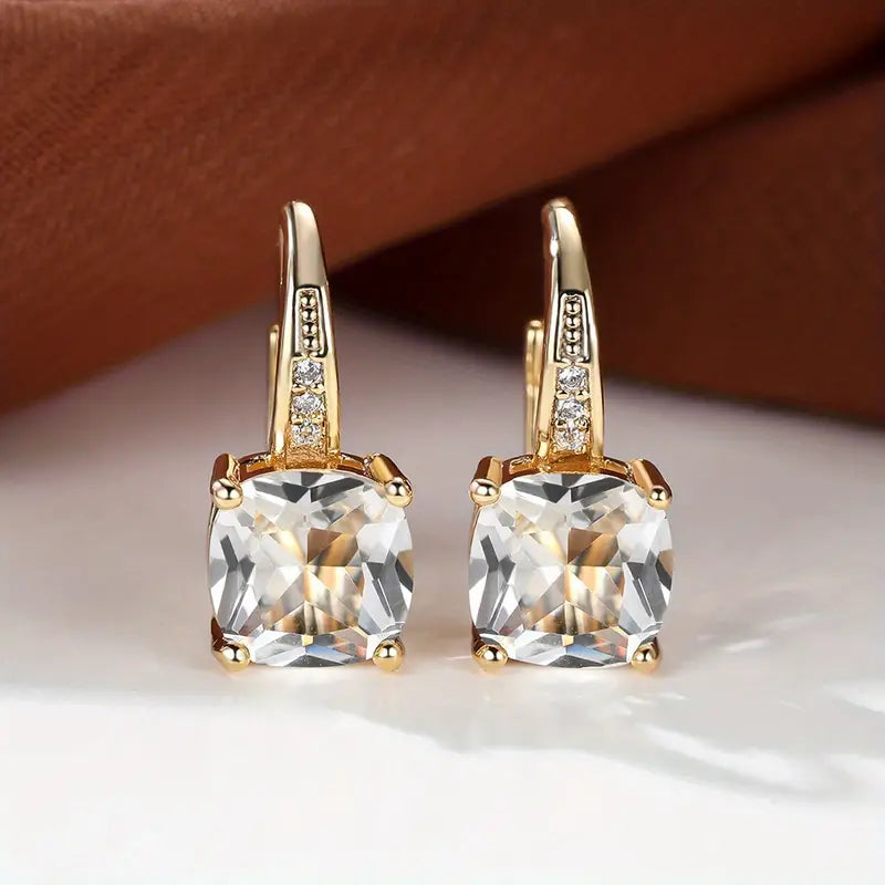 Claudine – Ohrringe aus Gold mit mystischem Saphir