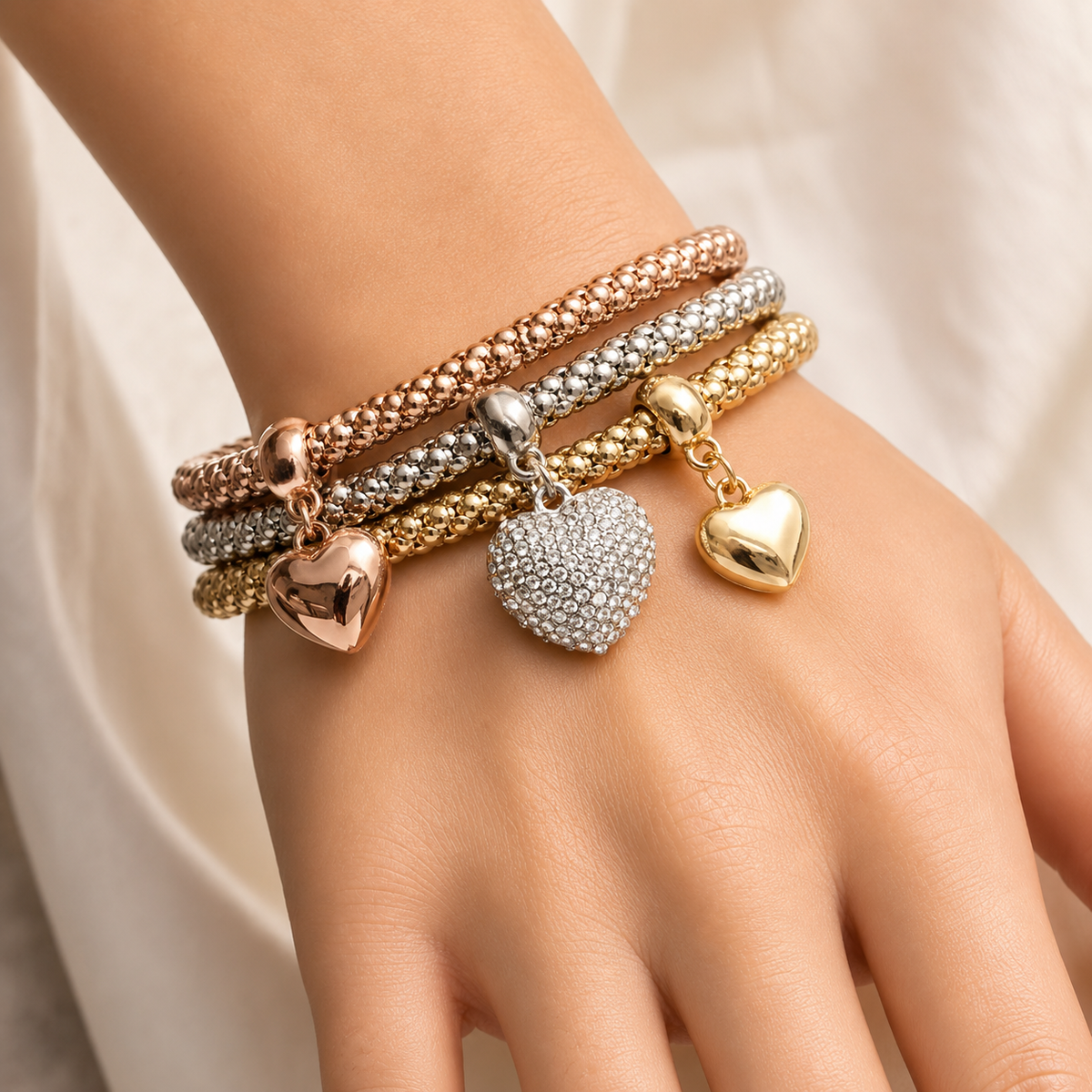 Aria – Metallarmband mit soliden Herzen