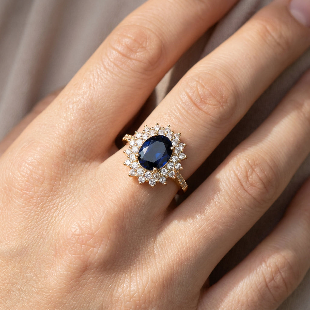 Delphine – Chic goldring mit blauer Stein
