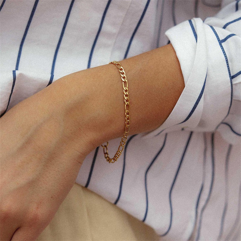 Saturn - Armband aus goldener Kette