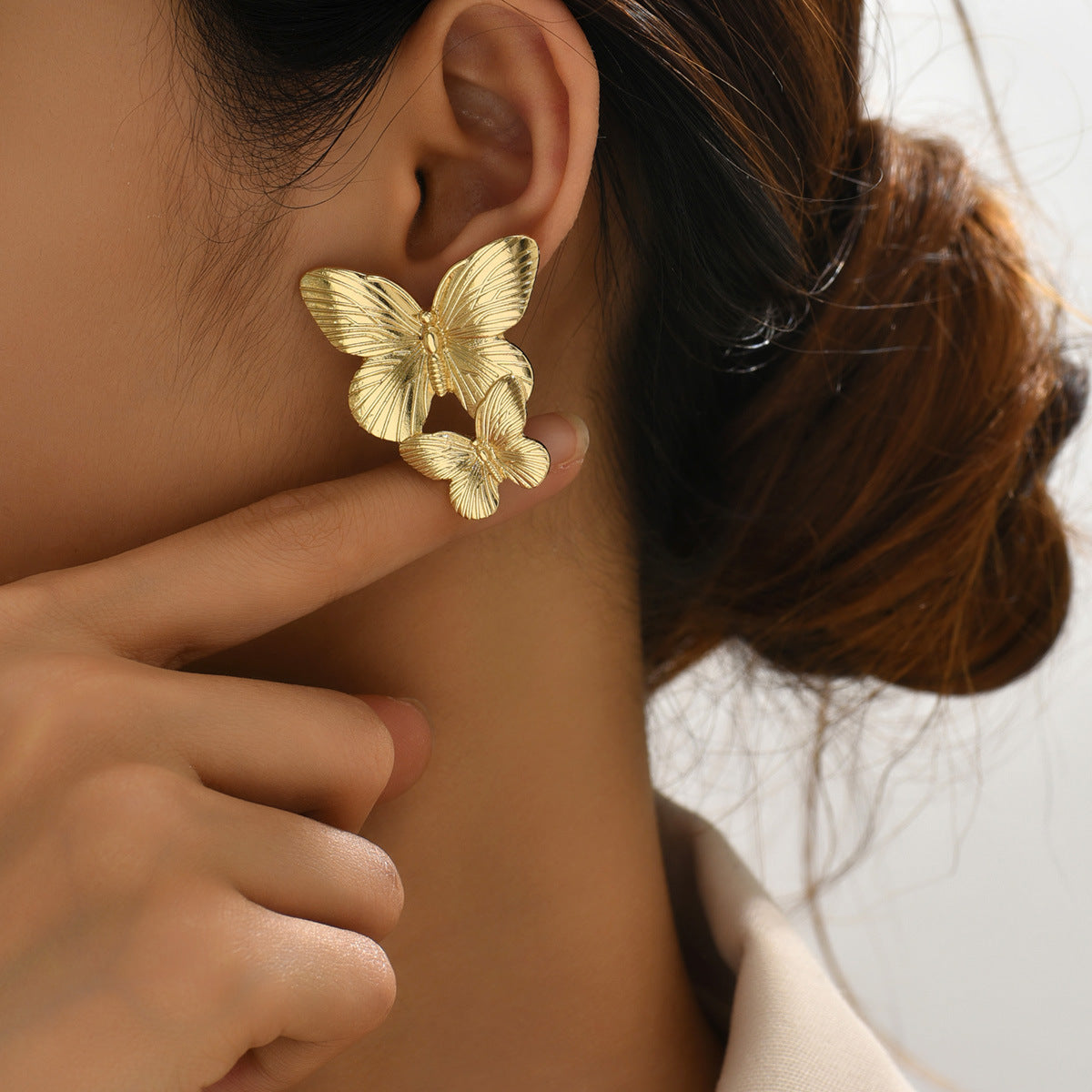 Mariah - Ohrringe aus Gold in Schmetterlingsform