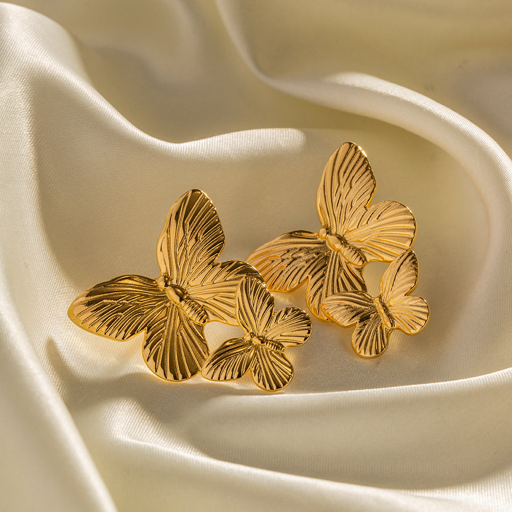 Mariah - Ohrringe aus Gold in Schmetterlingsform