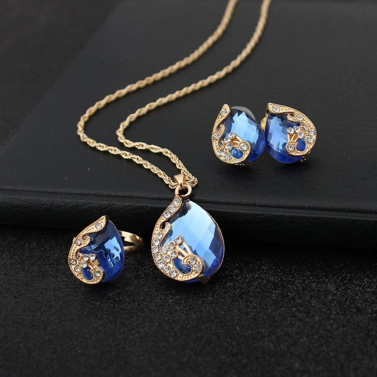 Pia – Set von Schmuck mit Halskette und Ohrringen aus blauem und goldenem Kristall