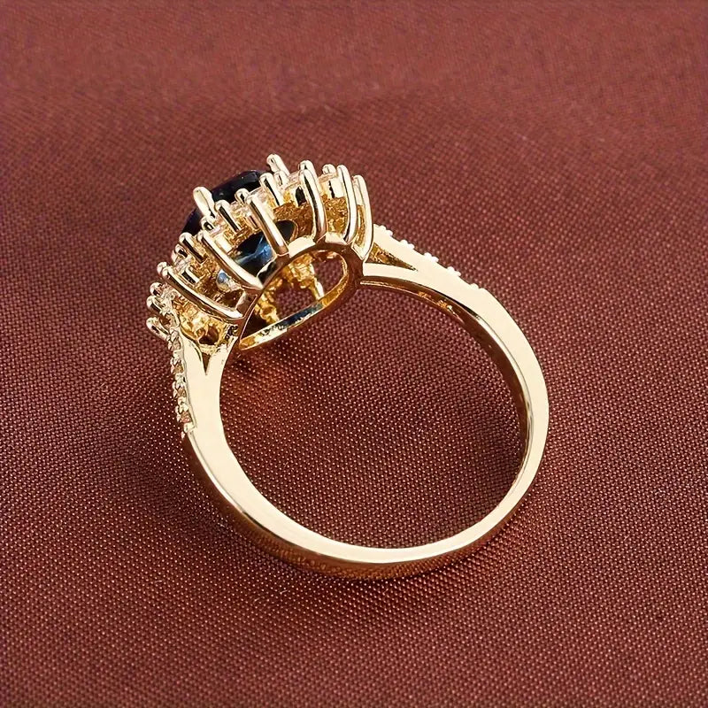 Delphine – Chic goldring mit blauer Stein