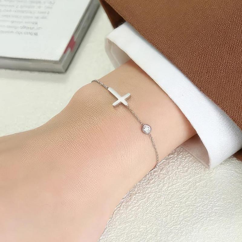 Althea – Armband mit Kreuz für Damen in Gold und Silber