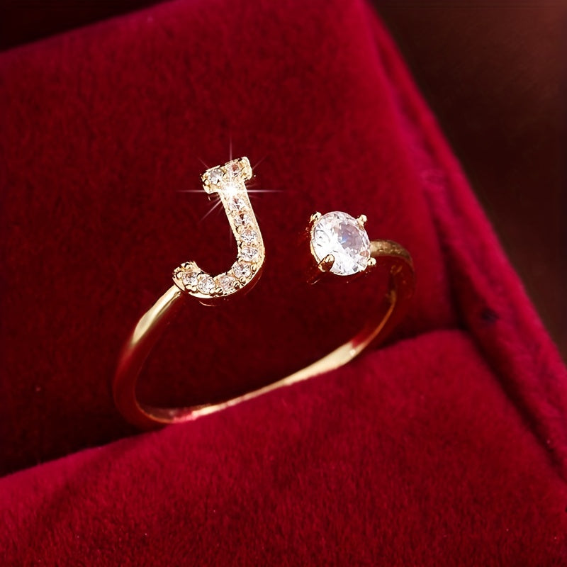 Nova – Offenes modernes Ring mit Initiale und Zirkonia