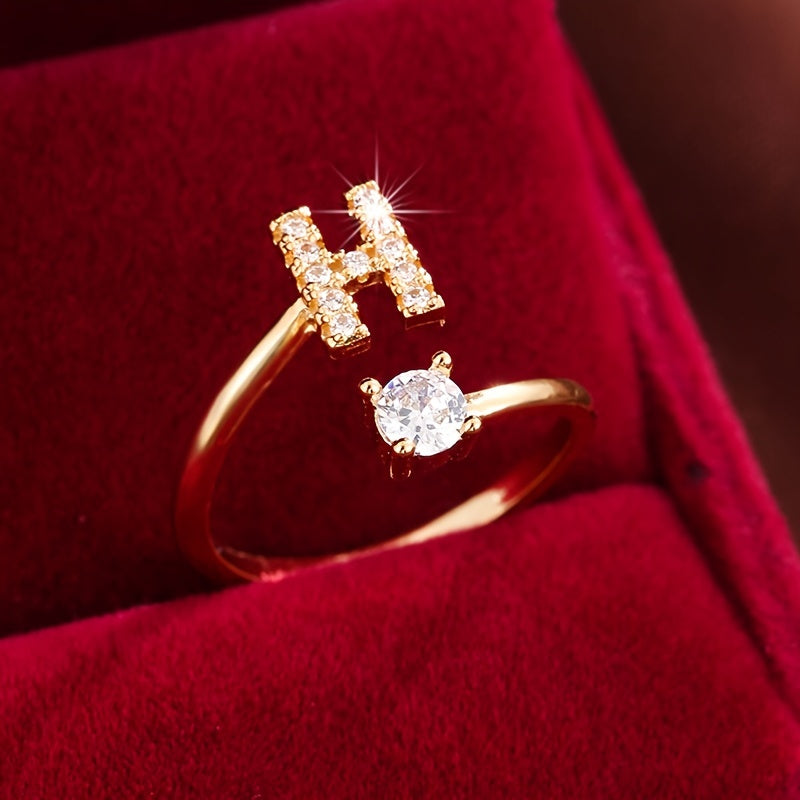 Nova – Offenes modernes Ring mit Initiale und Zirkonia