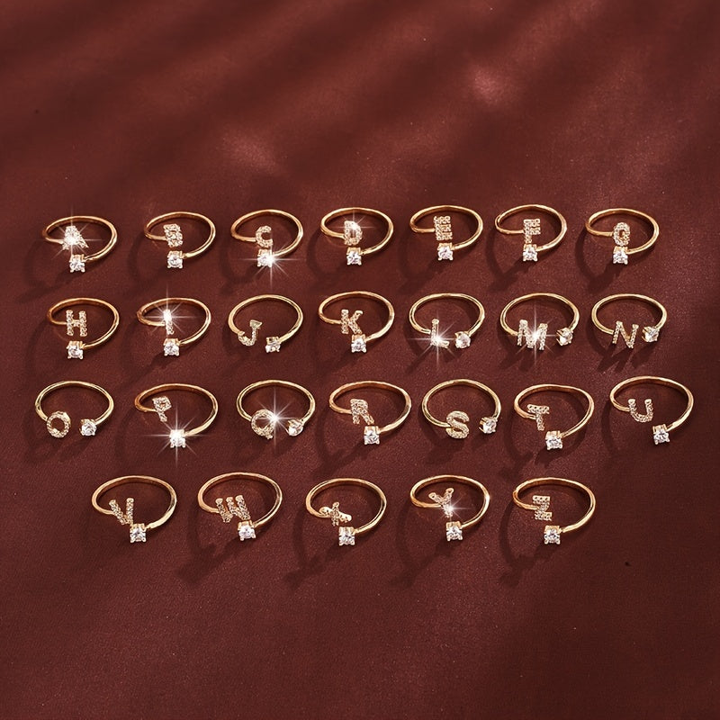 Nova – Offenes modernes Ring mit Initiale und Zirkonia