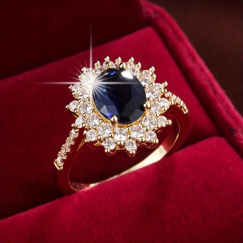 Delphine – Chic goldring mit blauer Stein