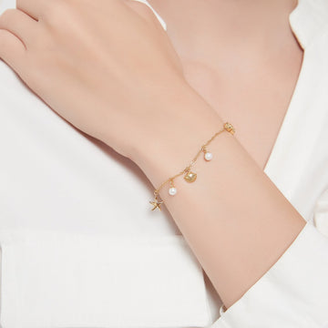 Armband mit Muschel und Seestern