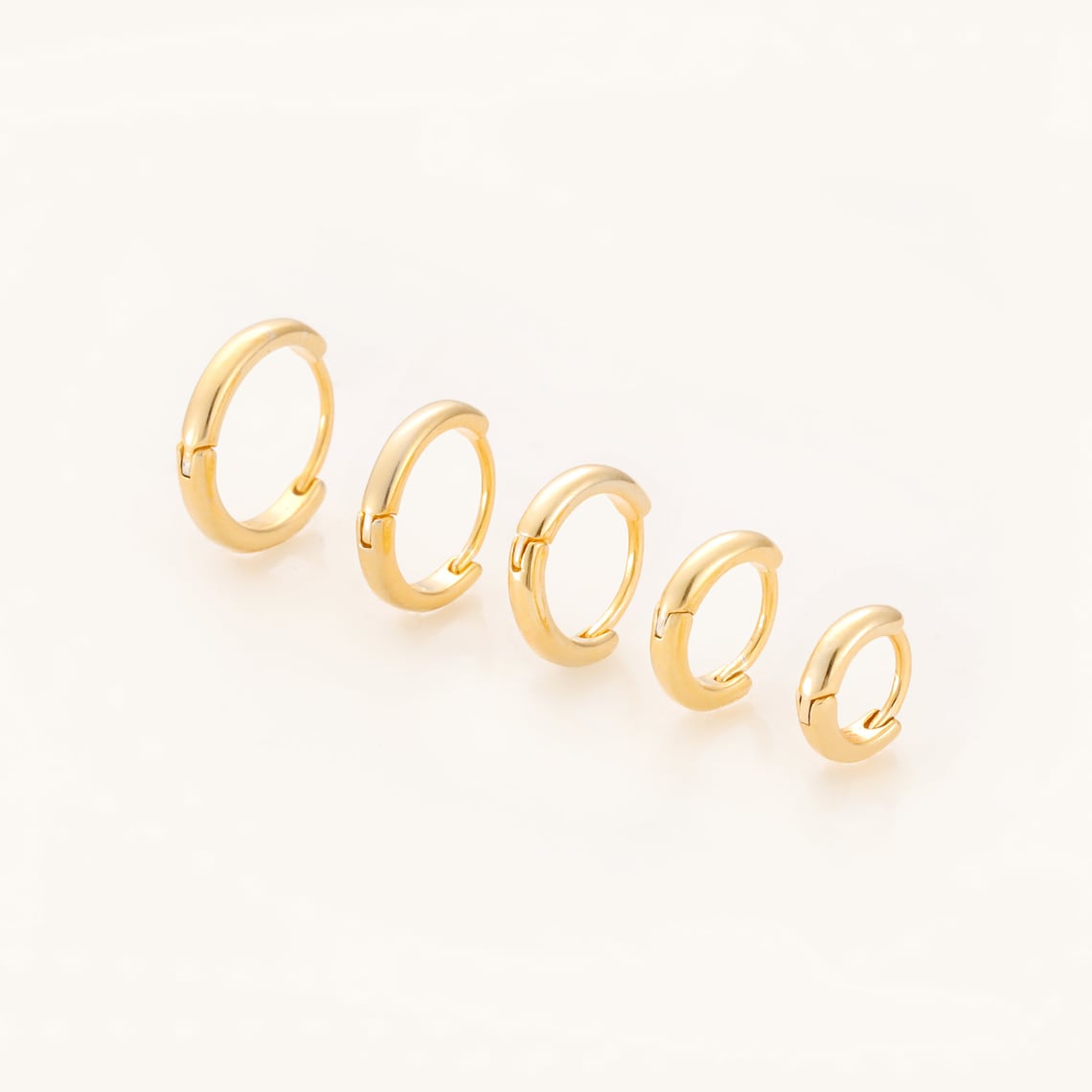 Goldene Huggie Ohrringe - 7 Teile Ohrringe