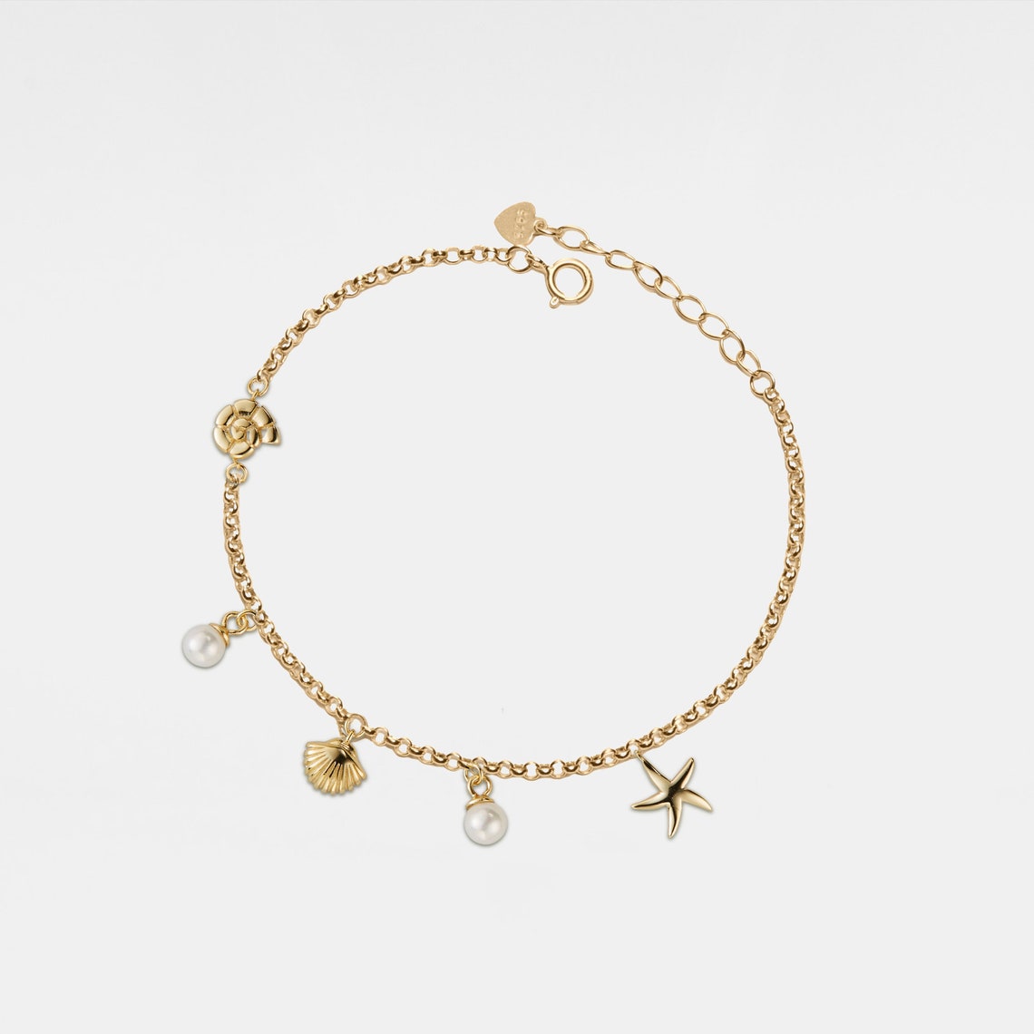 Armband mit Muschel und Seestern