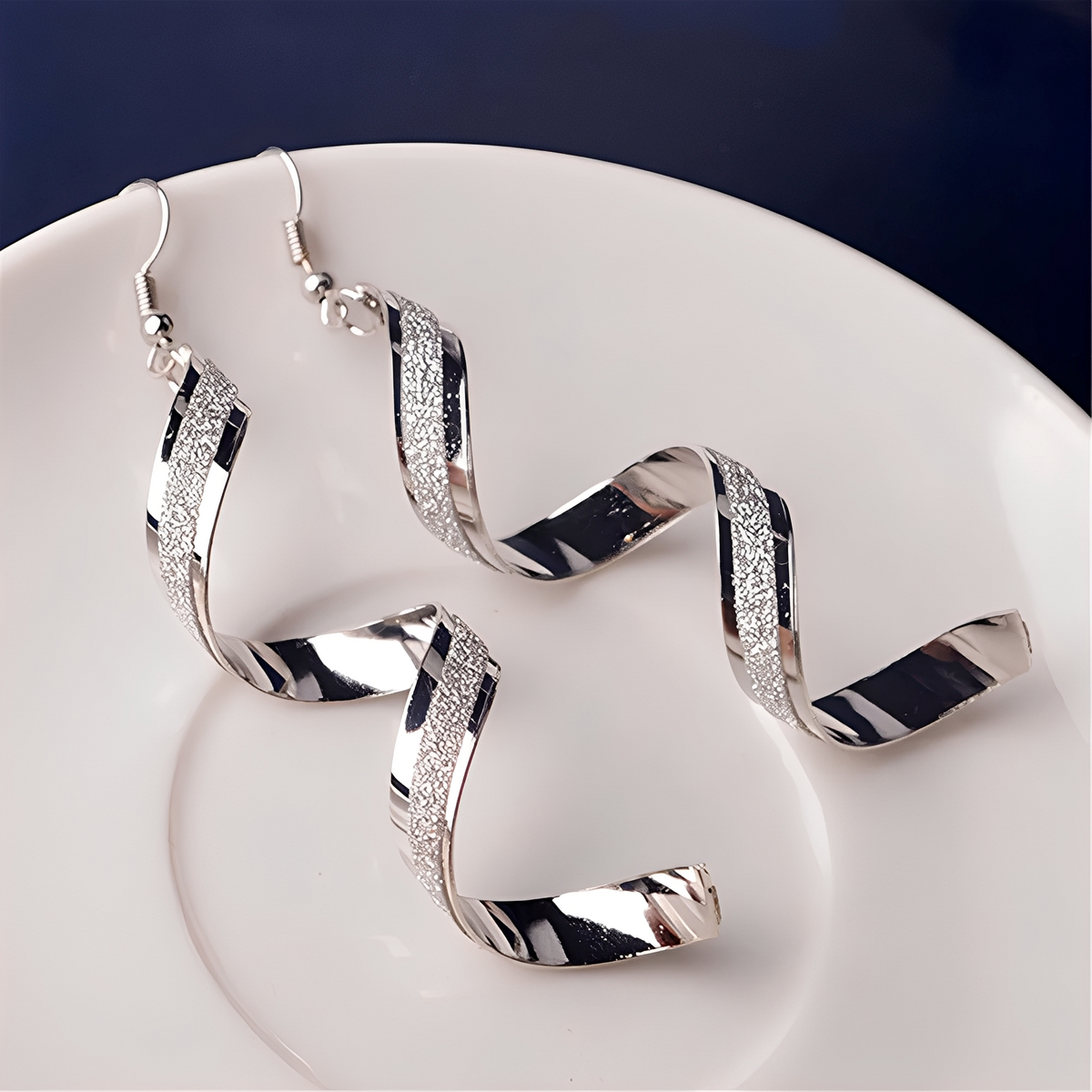 Jia – Ohrringe Spiralen aus Silber mit Glanz