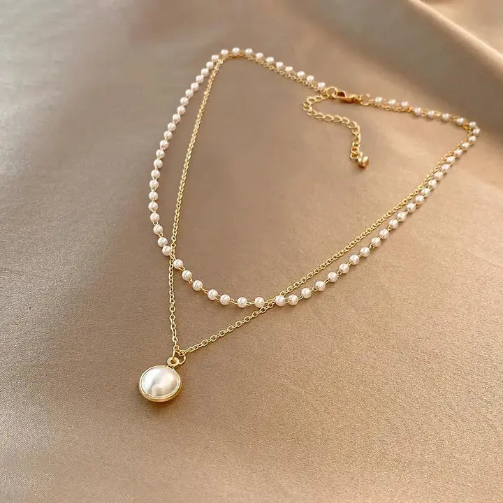 Auriane – Elegantes Perlen- und Goldkettencollier