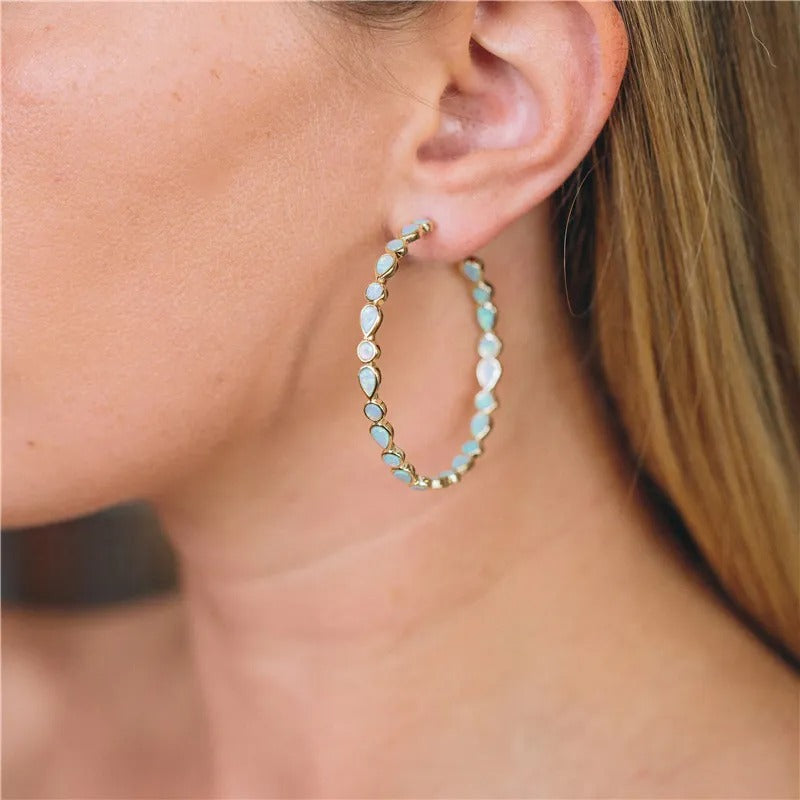 Raya – Vintage goldene Ohrringe mit blauem Opal