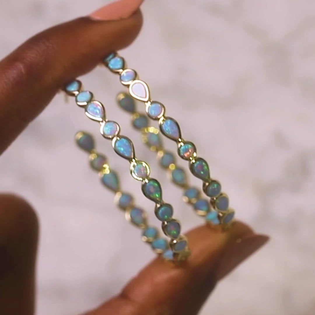 Raya – Vintage goldene Ohrringe mit blauem Opal