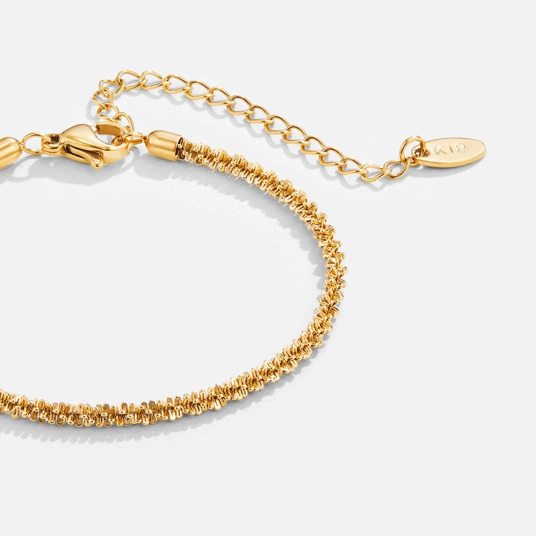 Kai – Raffinierte 18K Goldarmband
